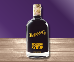 A 12.75 ounce bottle of Huckleberry syrup.