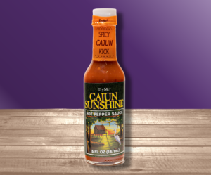 Huckleberry Cajun Sunshine Hot Sauce in a 5oz bottle.