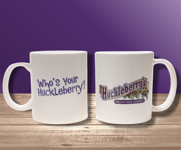 Huckleberry coffee mug with a Huckleberry logo and the slogan Who's Your Huckleberry? on the mug.
