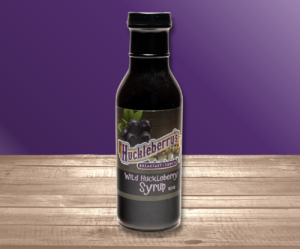 Huckleberry Hucks Syrup in a 12.5oz bottle.